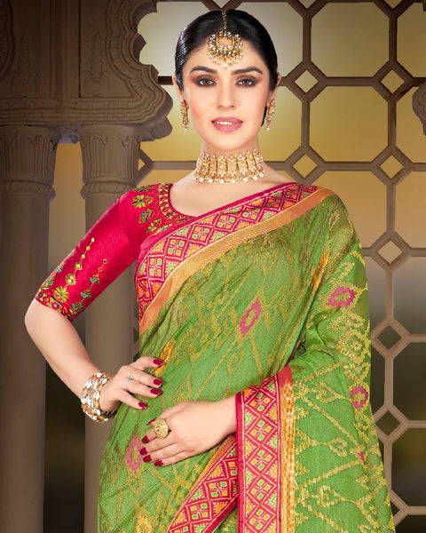 Parrot Green Brasso Saree With Weaved Satin Patta And Tassel