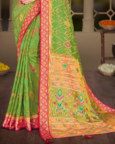 Parrot Green Brasso Saree With Weaved Satin Patta And Tassel