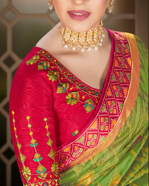 Parrot Green Brasso Saree With Weaved Satin Patta And Tassel