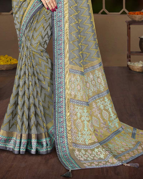 Grey Brasso Saree With Weaved Satin Patta And Tassel
