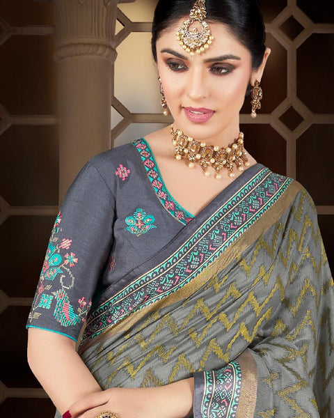 Grey Brasso Saree With Weaved Satin Patta And Tassel
