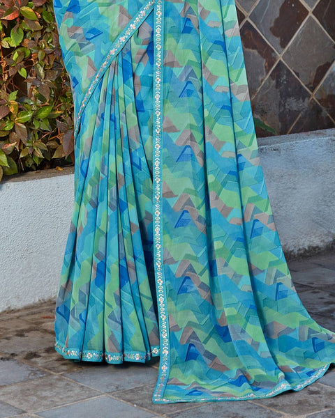 Pelorus Blue Printed Georgette Saree With Fancy Border