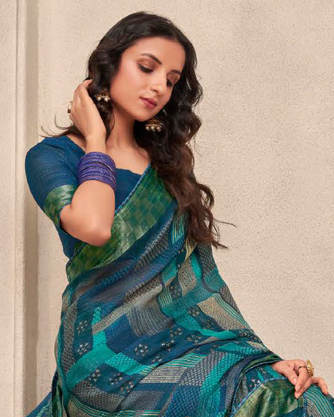 Peacock Blue Printed Moss Chiffon Saree With Foil Print And Fancy Border