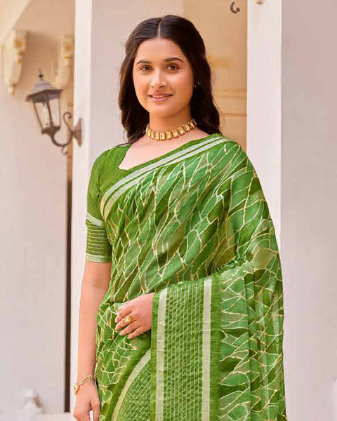 Dark Green Printed Moss Chiffon Saree With Foil Print And Weaved Fancy Border