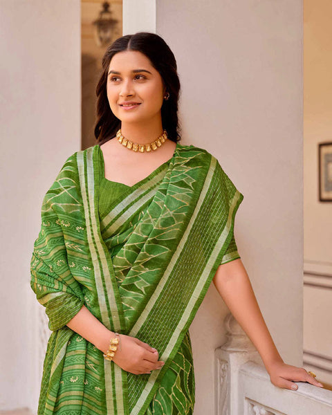 Dark Green Printed Moss Chiffon Saree With Foil Print And Weaved Fancy Border